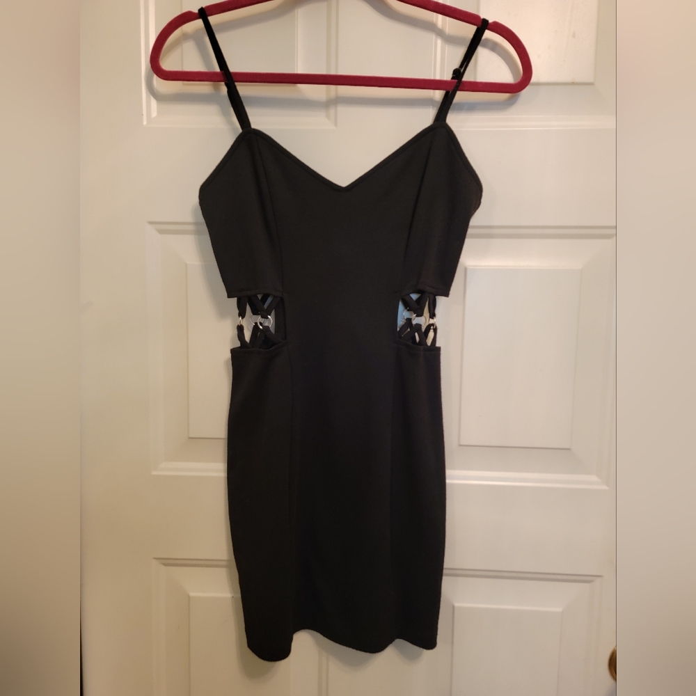 Sexy black bodycon mini dress with open side details size Medium Forever 21